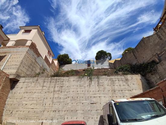 Parcela de 400 m2 en el Puerto de la Torre. - MALAGA