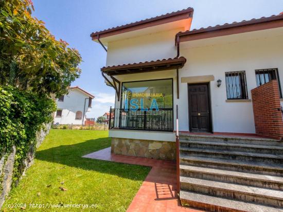 Chalet pareado de ensueño en Isla: ¡Tu oasis de paz junto al mar! - CANTABRIA