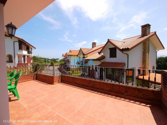 Chalet pareado de ensueño en Isla: ¡Tu oasis de paz junto al mar! - CANTABRIA