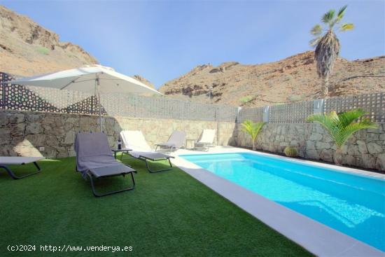 VIVIENDA DE LUJO CON AMPLIO JARDÍN Y PISCINA PRIVADA CLIMATIZADA EN TAURO. - LAS PALMAS