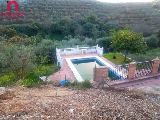 CASA DE DOS PLANTAS CON PISCINA Y CON AGUA POTABLE - CORDOBA