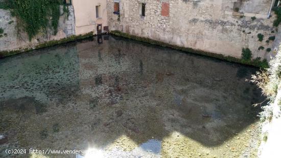 Se vende casa de 4 plantas con jardín, nacimientos de agua y local en COCENTAINA - ALICANTE