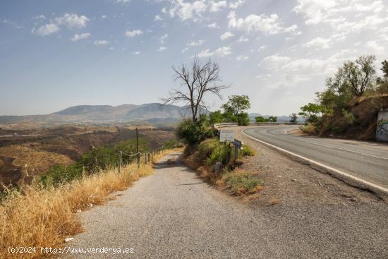 Magnífica finca de 15 ha. con Casa Cortijo  Los Carmencillos  en Aynadamar - GRANADA