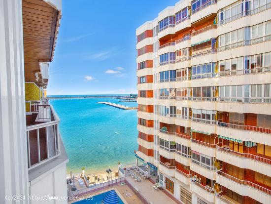Apartamento reformado en Torrevieja con vistas al mar y piscina comunitaria - ALICANTE
