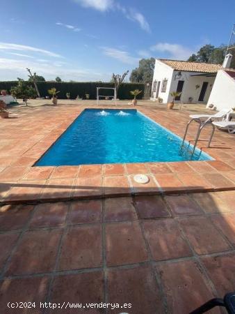 ZONA LA GORGOJA - Parcela de terreno de 2.250 m2 con casa de 160m2, piscina y salon campero - CORDOB