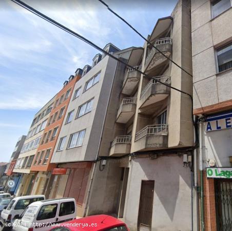  Edificio de bajo y tres alturas en Doctor Fleming de Carballo - A CORUÑA 