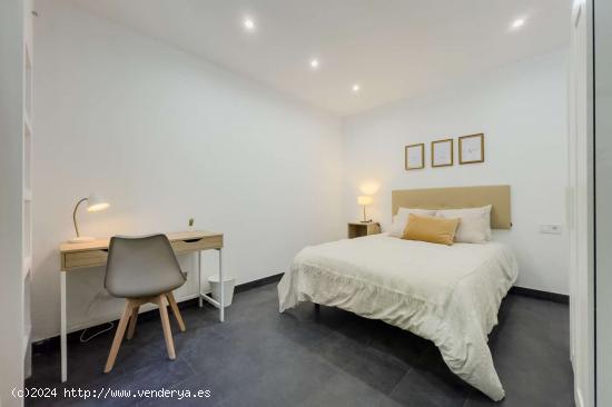 Dormitorio en un apartamento de 7 habitaciones en Barcelona - BARCELONA