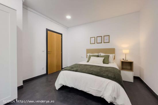 Dormitorio en un apartamento de 7 habitaciones en Barcelona - BARCELONA