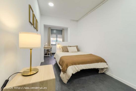 Dormitorio en un apartamento de 7 habitaciones en Barcelona - BARCELONA