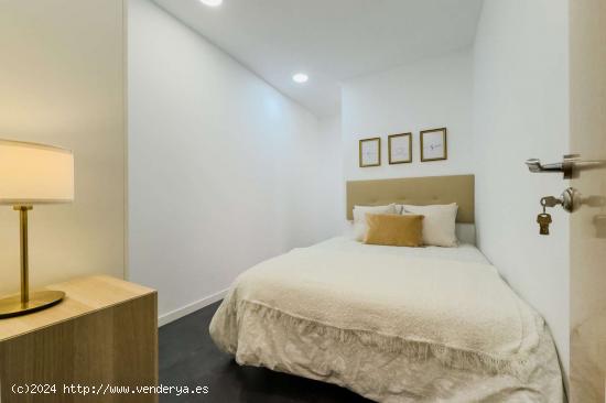 Dormitorio en un apartamento de 7 habitaciones en Barcelona - BARCELONA