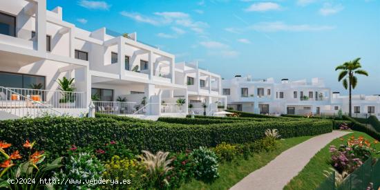 VIVIENDA ADOSADA EN MANILVA CON AMPLIO JARDÍN PRIVADO, SOLARIUM Y SÓTANO - MALAGA