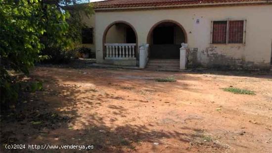  PARCELA CON VIVIENDA EN VENTA - SEVILLA 