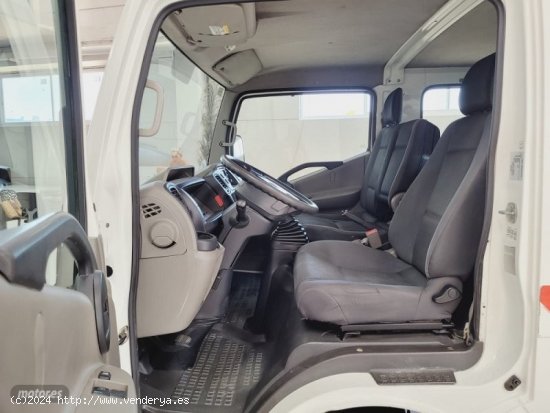 Nissan Cabstar caja abierta con toldo,140cv de 2014 con 168.455 Km por 15.990 EUR. en Valencia