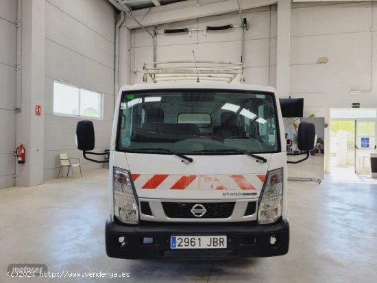 Nissan Cabstar caja abierta con toldo,140cv de 2014 con 168.455 Km por 15.990 EUR. en Valencia