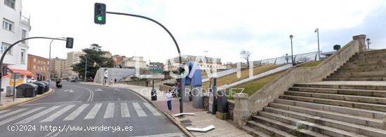 Calle Menacho. Local comercial de moda.