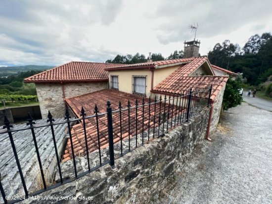 Casa de 350 m2 construida en un terreno de 5.125 m2 (urbano y rústico)