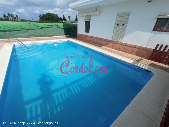 CASA CON TERRENO, GARAJE Y PISCINA EN EL HIGUERON - CORDOBA