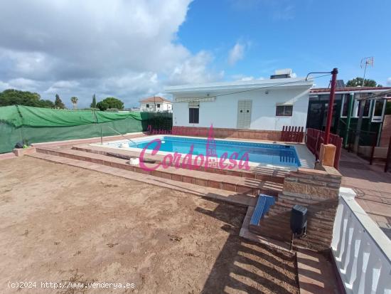 CASA CON TERRENO, GARAJE Y PISCINA EN EL HIGUERON - CORDOBA