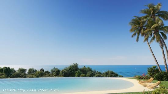 casa de cuatro  dormitorios con jardín 218m2 y espectaculares vistas al mar - MALAGA