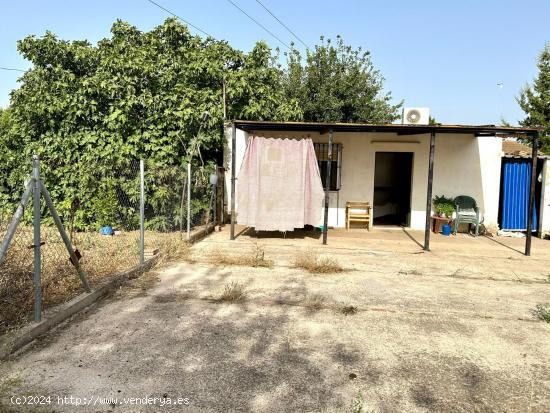 ZONA HIGUERON - Parcela de terreno de 1.300m con salon campero, con pozo y luz y 2 cuadras. - CORDOB