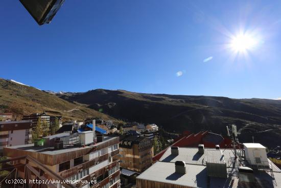 ¡FANTÁSTICO PISO CON PISCINA CUBIERTA Y COCHERA EN SIERRA NEVADA! - GRANADA