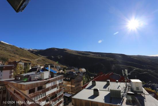 ¡FANTÁSTICO PISO CON PISCINA CUBIERTA Y COCHERA EN SIERRA NEVADA! - GRANADA