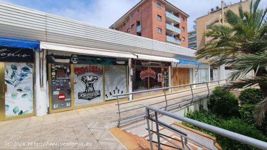 Dos locales comerciales en el paseo en primera línea de mar. - BARCELONA