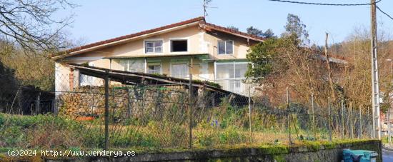 Casa y terreno de 3.000 m2. - CANTABRIA