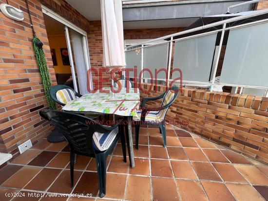 BAJO CON TERRAZA JUNTO AL CENTRO DE LA VILLA. NOJA - CANTABRIA