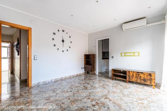 Vive en la Tranquilidad y Comodidad de la Planada del Pintor: Espacioso Piso de 80m² en Sabadell - 