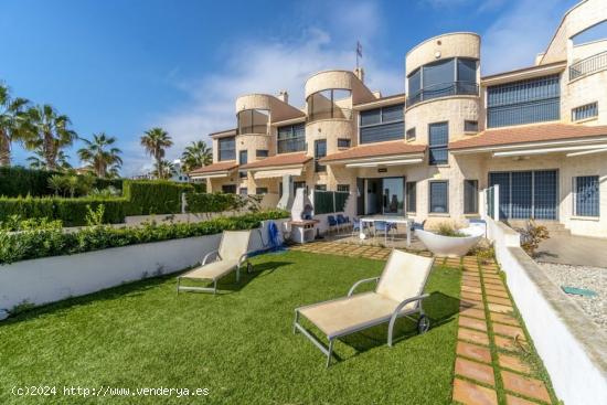 Precioso dúplex en la primera línea de la playa de Aguamarina. - ALICANTE