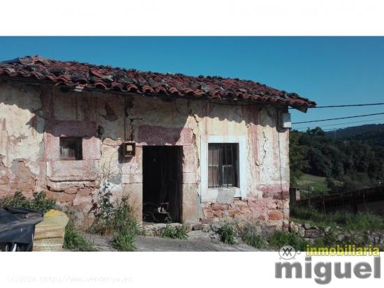 Se vende casa de piedra para rehabilitar  con jardín en Cades - CANTABRIA