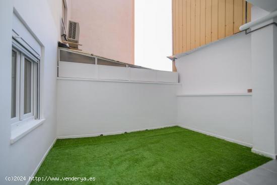  ¡Encuentra tu oasis urbano en este inmueble completamente renovado en el corazón de la ciudad! - B 