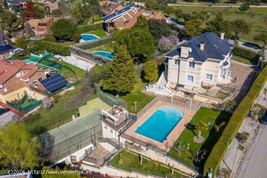 Chalet de 845m2 con espectaculares vistas en parcela de 1.916m2, piscina y garaje para 7 vehiculos -