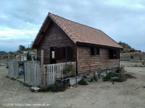  TERRENO CON CASA DE MADERA EN XIXONA - ALICANTE 