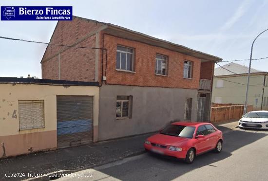 SE VENDE PARCELA URBANA CON VIVIENDA Y NAVE - LEON