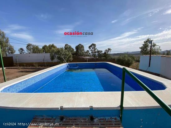 PARCELA CON CASA Y PISCINA A LA VENTA - CORDOBA