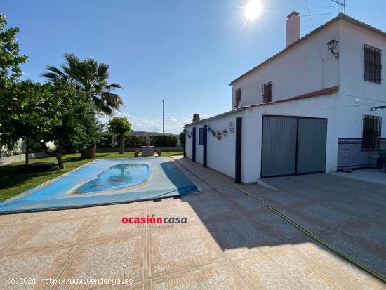 PRECIOSA PARCELA CON VIVIENDA Y PISCINA - CORDOBA