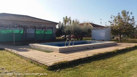 Parcela con casa sde 150 m2, piscina y nave de 65m2. - CORDOBA