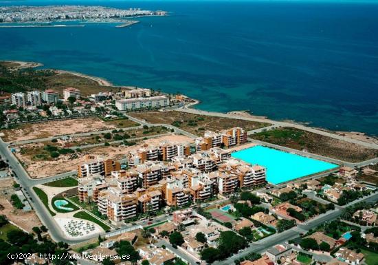 Apartamentos de obra nueva en Punta Prima, playa 50 metros - ALICANTE