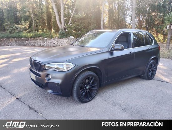 BMW X5 xDrive 30d 258cv 5p Paquete M - Rubí