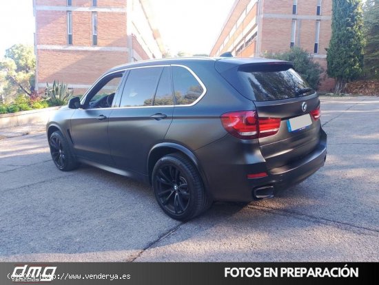 BMW X5 xDrive 30d 258cv 5p Paquete M - Rubí