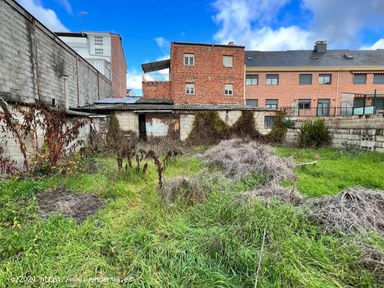 SE VENDE EDIFICIO DE 2 PISOS , BAJO Y FINCA - LEON