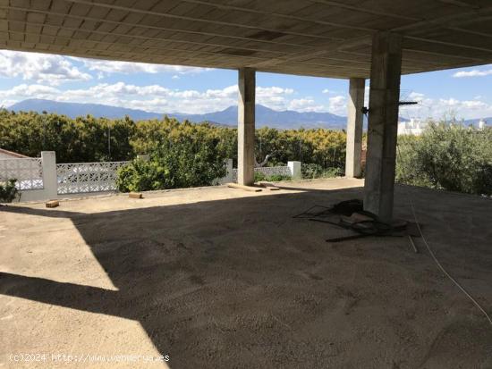 Parcela de terreno urbano con vivienda en construcción. - MALAGA