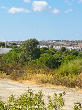 PARCELA EN COSTA ESURI CON MARAVILLOSAS VISTAS AL CAMPO DE GOLF Y RIO GUADIANA - HUELVA