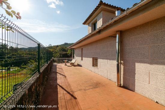 CASA DE DOS PLANTAS CON FINCA EN SOTOMAIOR - PONTEVEDRA