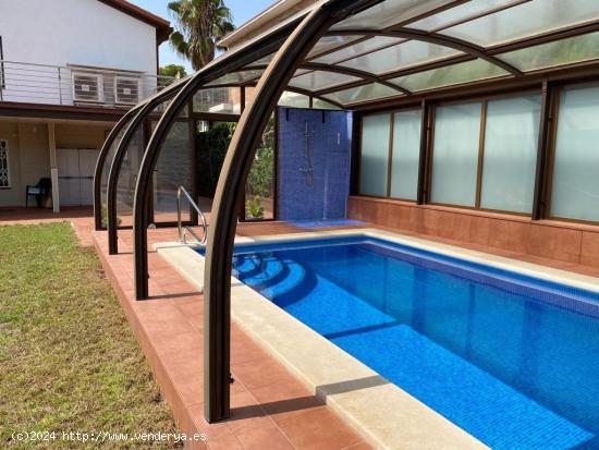 hermosa casa de dos viviendas con piscina climatizada en inmejorable zona Comarruga - TARRAGONA