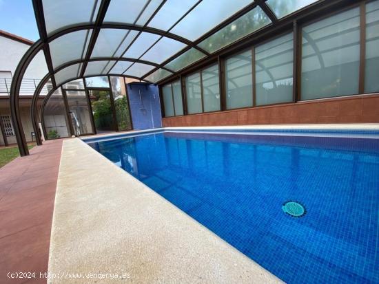 hermosa casa de dos viviendas con piscina climatizada en inmejorable zona Comarruga - TARRAGONA