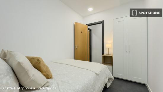 Dormitorio en un apartamento de 7 habitaciones en Barcelona - BARCELONA