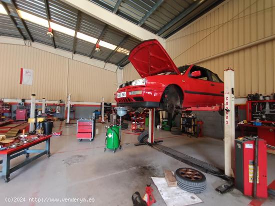 Taller automovil y parcela muy bien ubicados en la zona industrial de l'Hospitalet de l'Infant - TAR